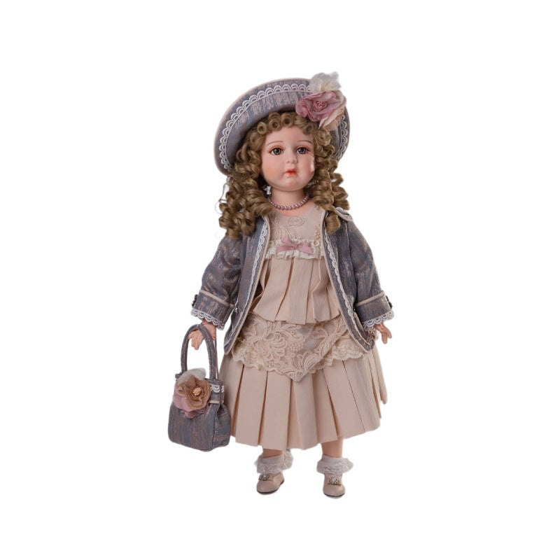 Muñeca antigua de porcelana bizcocho de 26 pulgadas con un atuendo espléndido