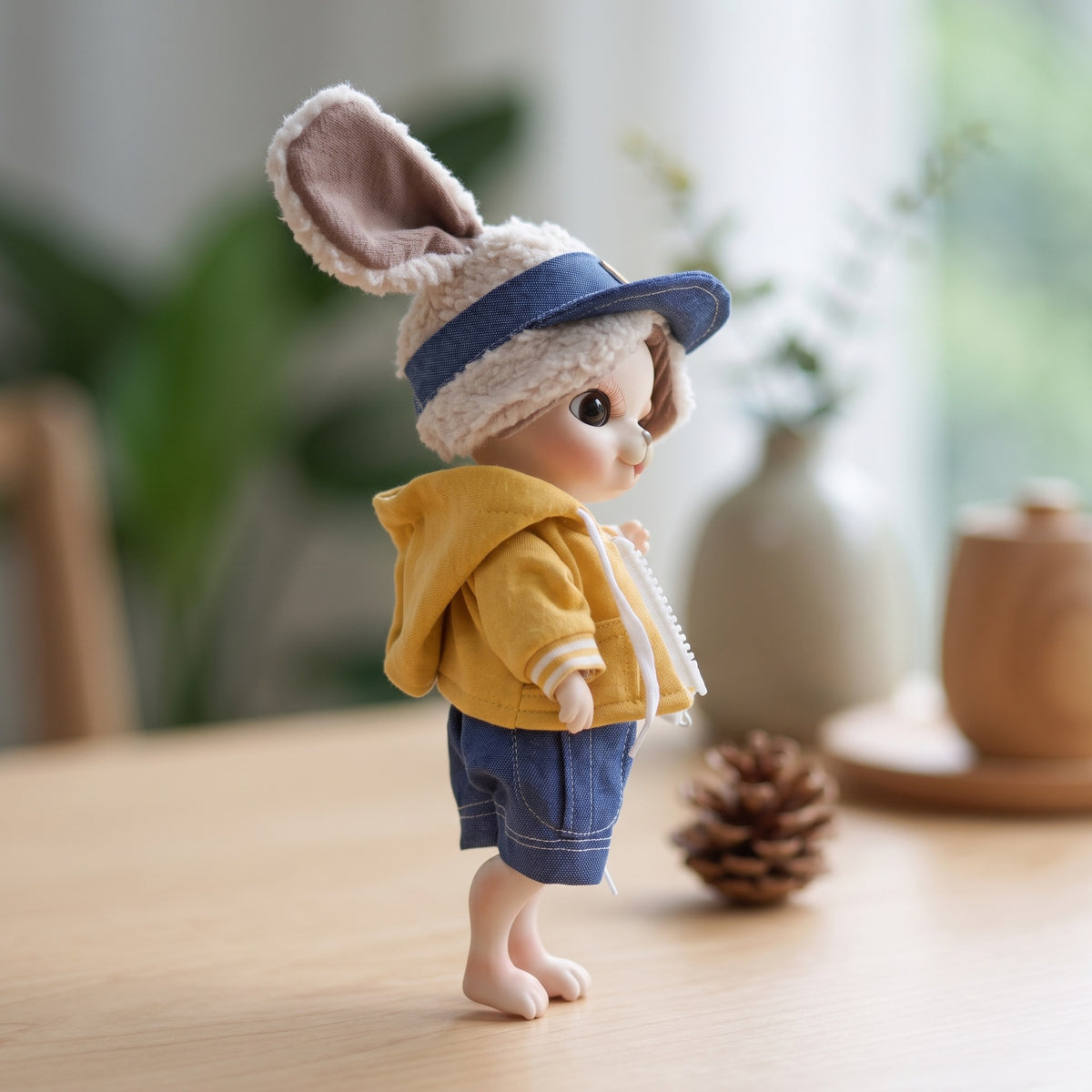 Muñeco bebé reborn de 10 pulgadas de un lindo animal con cuerpo de articulación esférica de cerámica completa y gorro de orejas esponjosas. Regalo de decoración coleccionable con atuendo.