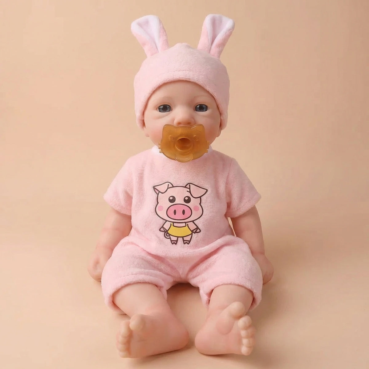 Muñeca de simulación de 12 pulgadas con gorro de orejas de conejo, muñeca de silicona de reencarnación