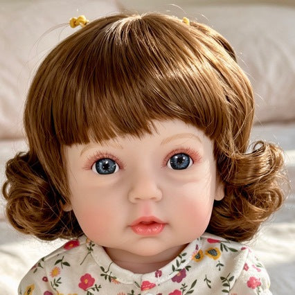 Muñeca bebé Reborn realista, muñeca de vinilo de 20 pulgadas estilo recién nacido con cabello castaño y ojos azules.