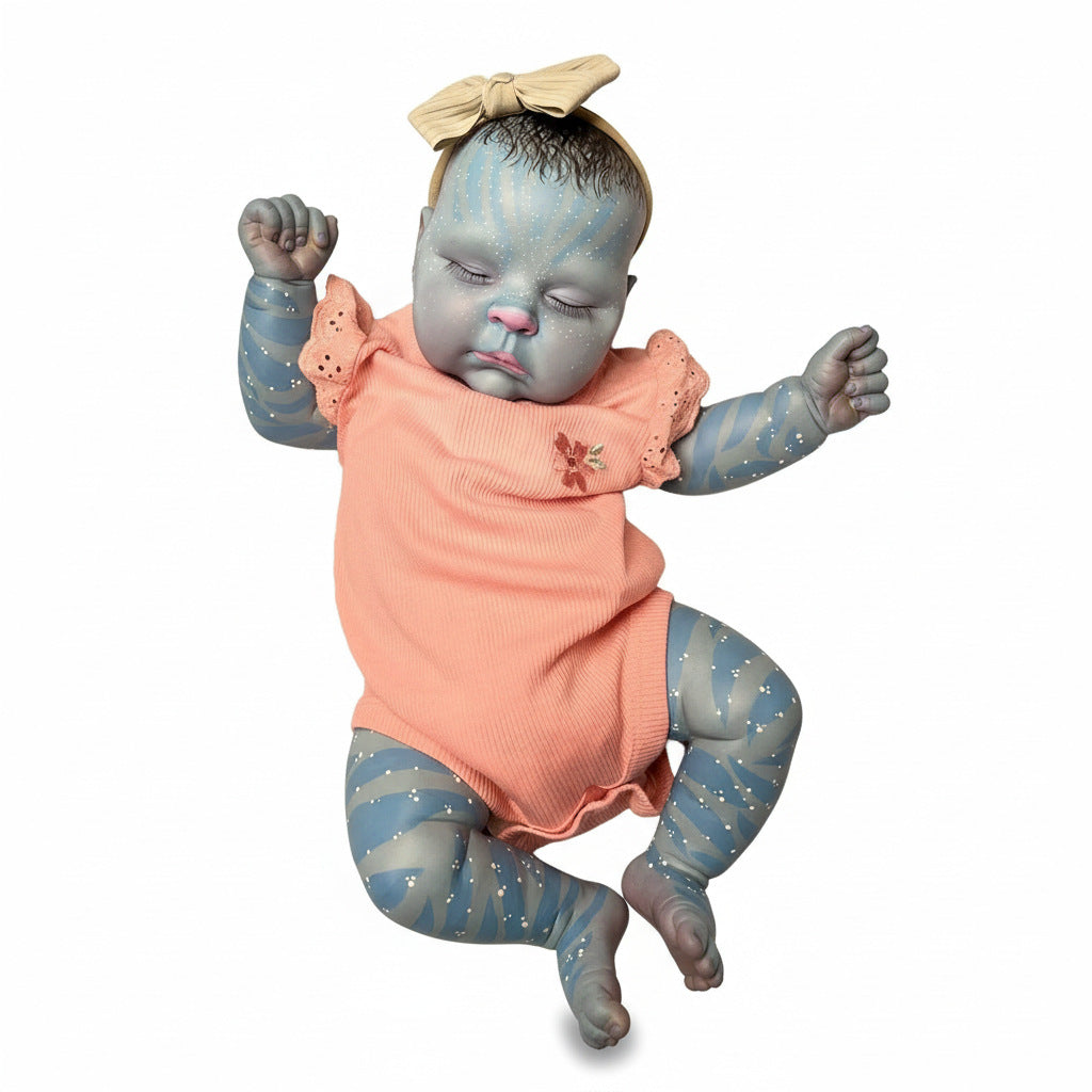 Muñeca reborn de 19 pulgadas, bebé de gama alta cuidadosamente pintado a mano al "estilo Avatar" con su icónico tono de piel y patrón de estrellas.