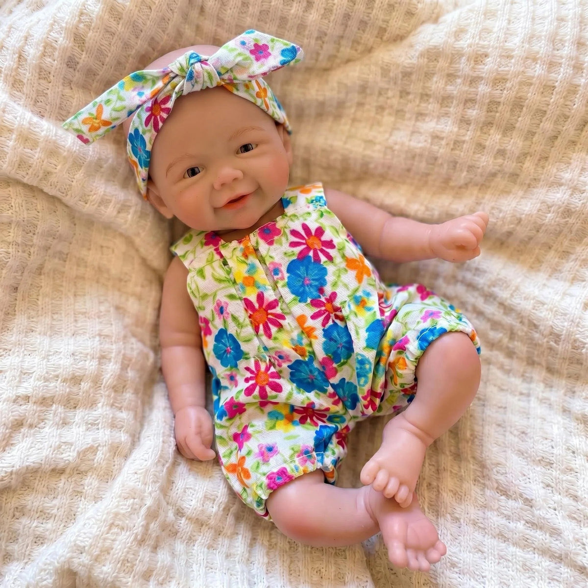 Muñeca reborn de 8 pulgadas con cuerpo completo de silicona sólida y mono con estampado floral, regalo de Navidad para niños