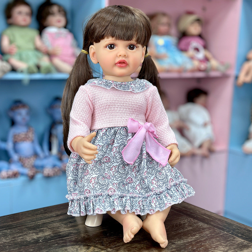 Muñeca coleccionable de vinilo de 22 pulgadas con aspecto realista, peinado de dos coletas, juguete de compañía para niños y coleccionistas adultos de todas las edades
