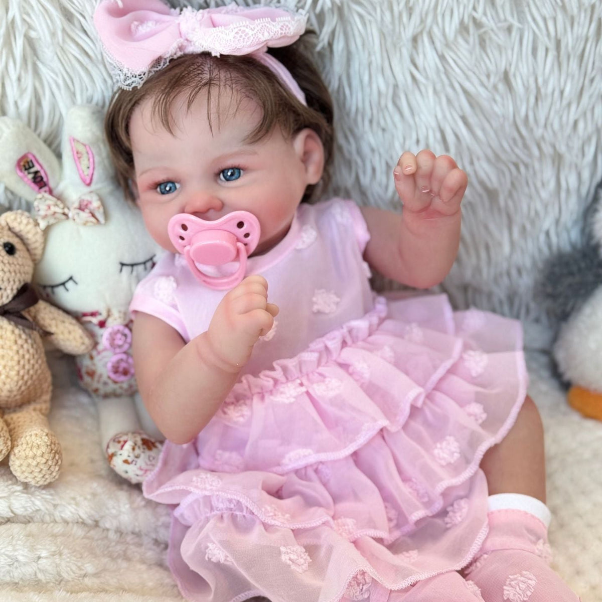 Muñeca Reborn de 18 pulgadas con cuerpo de tela, disponibles en diferentes tipos y estilos. Regalo coleccionable para festividades o cumpleaños.