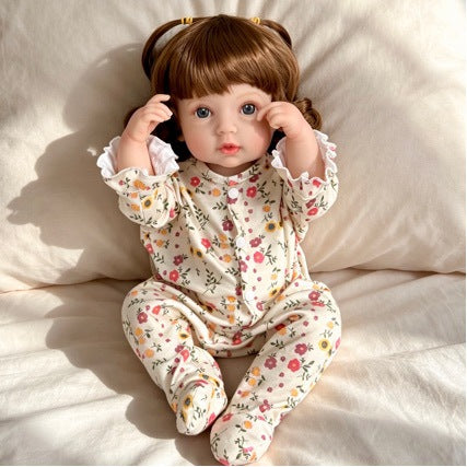 Muñeca bebé Reborn realista, muñeca de vinilo de 20 pulgadas estilo recién nacido con cabello castaño y ojos azules.