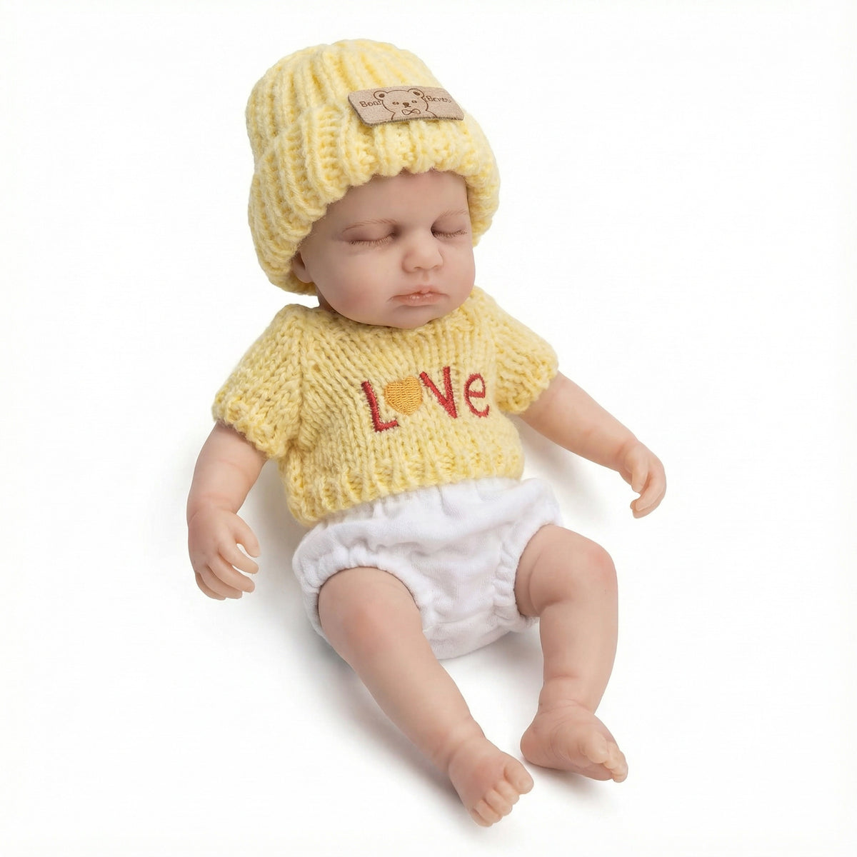 Muñeca Reborn de silicona completa de 8 pulgadas con conjunto amarillo de manga corta