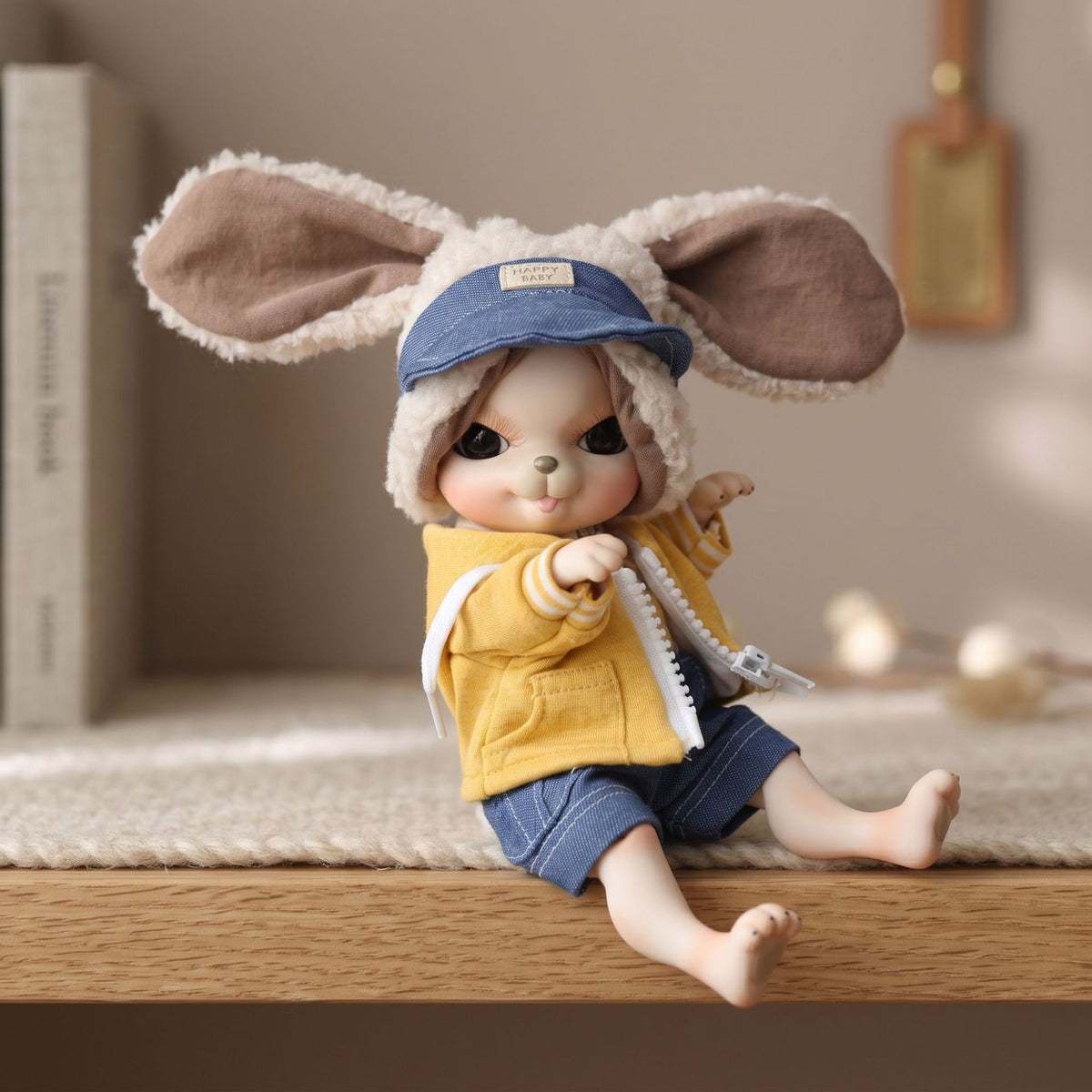 Muñeco bebé reborn de 10 pulgadas de un lindo animal con cuerpo de articulación esférica de cerámica completa y gorro de orejas esponjosas. Regalo de decoración coleccionable con atuendo.