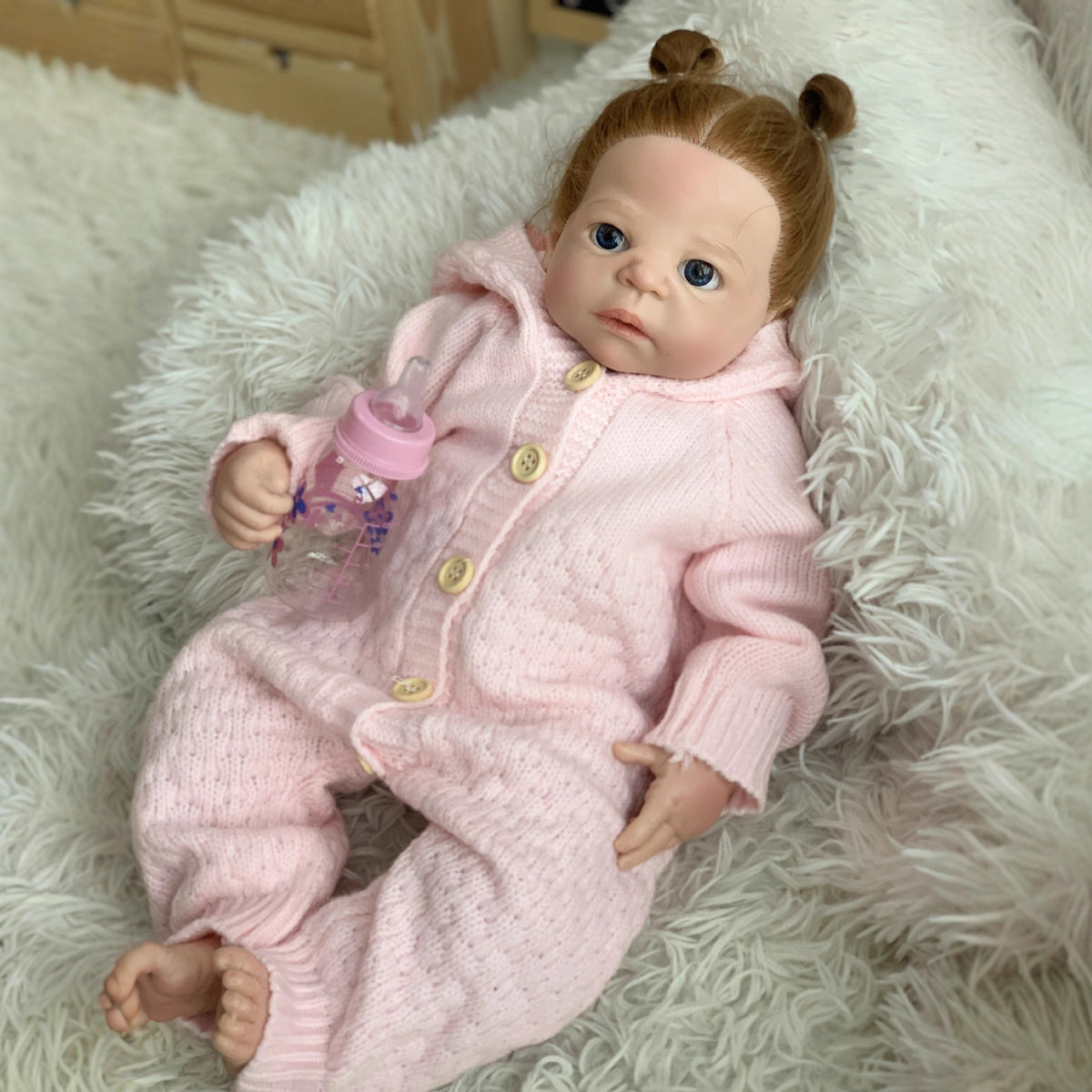 Muñeca Reborn de silicona sólida de 22 pulgadas, realista, recién nacida, con conjunto de punto rosa y biberón, juguete para niña, regalo de colección