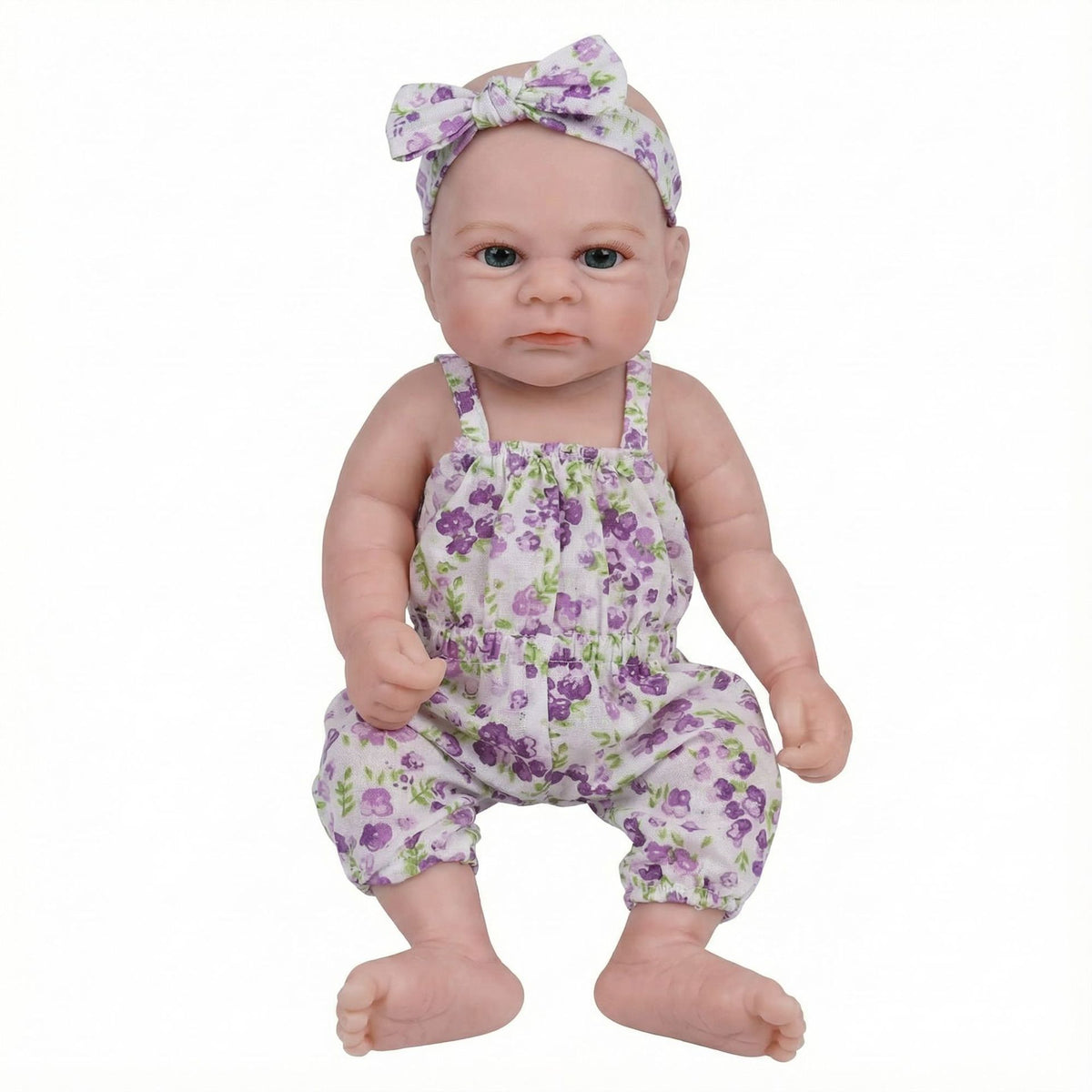 Muñeca reborn de silicona sólida de 12 pulgadas con enterizo floral morado