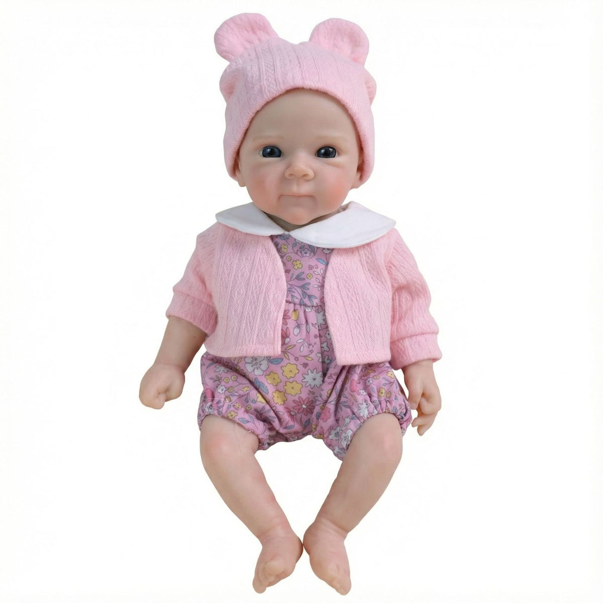 Muñeca reborn de silicona de 12 pulgadas con chaqueta rosa y estampado floral pequeño