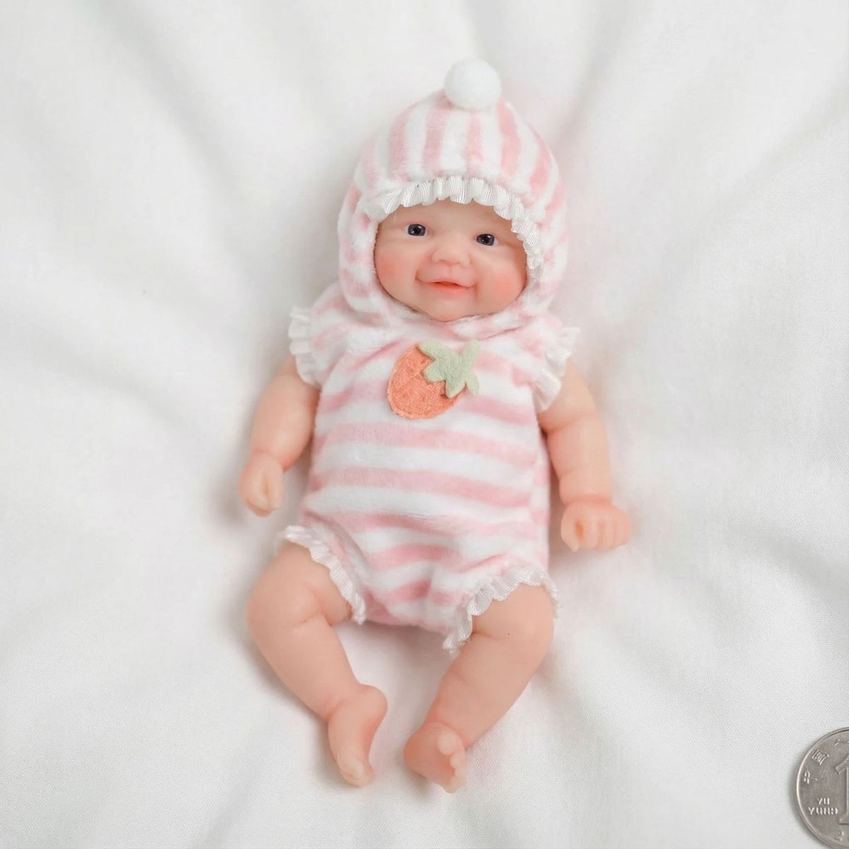 Muñeca reborn sólida de silicona de 6 pulgadas con estampado de fresas