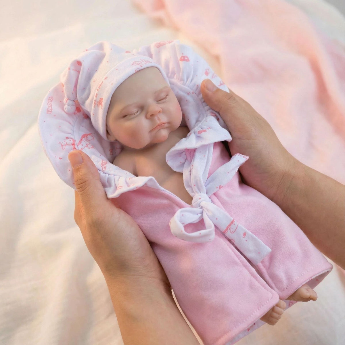 Bolso rosa de 12 pulgadas con muñeca reborn de silicona sólida Pascale como regalo de Navidad para niños