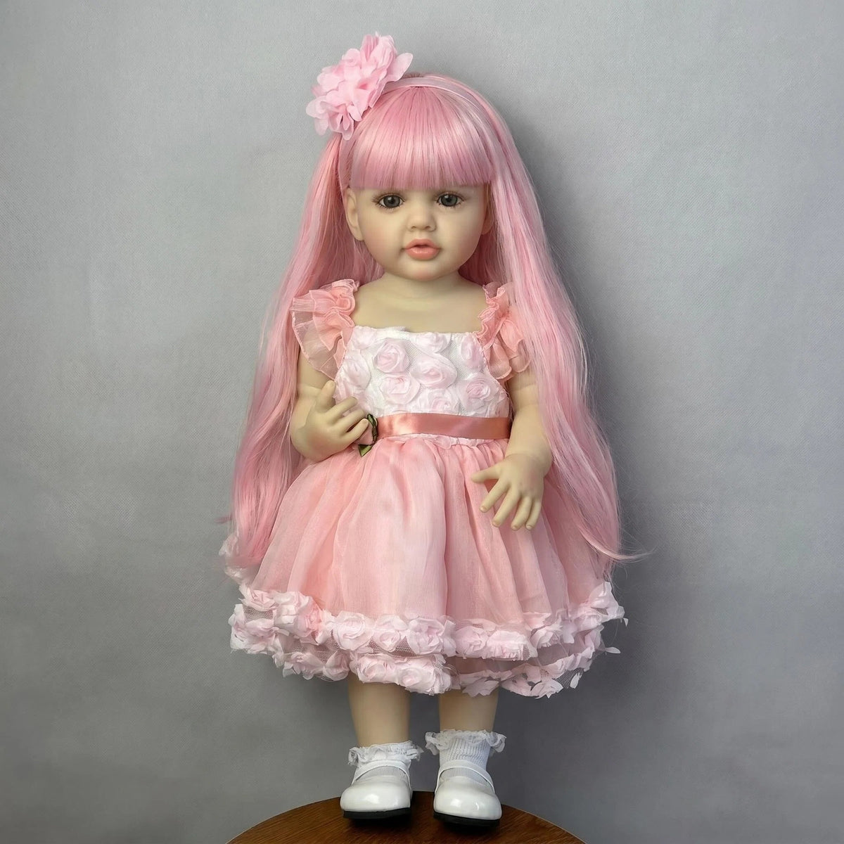 Muñeca Reborn de cuerpo completo de vinilo de 22 pulgadas, niña de cabello largo rosa, maravilloso regalo para baby shower y toda ocasión