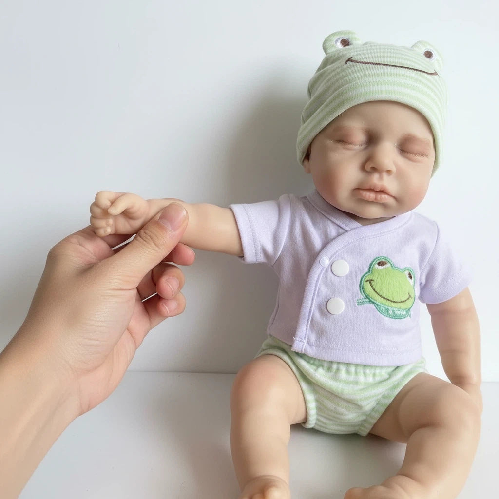 Muñeca reborn de silicona sólida de 12 pulgadas con gorro de rana verde, muñeco de juguete de simulación LOULOU