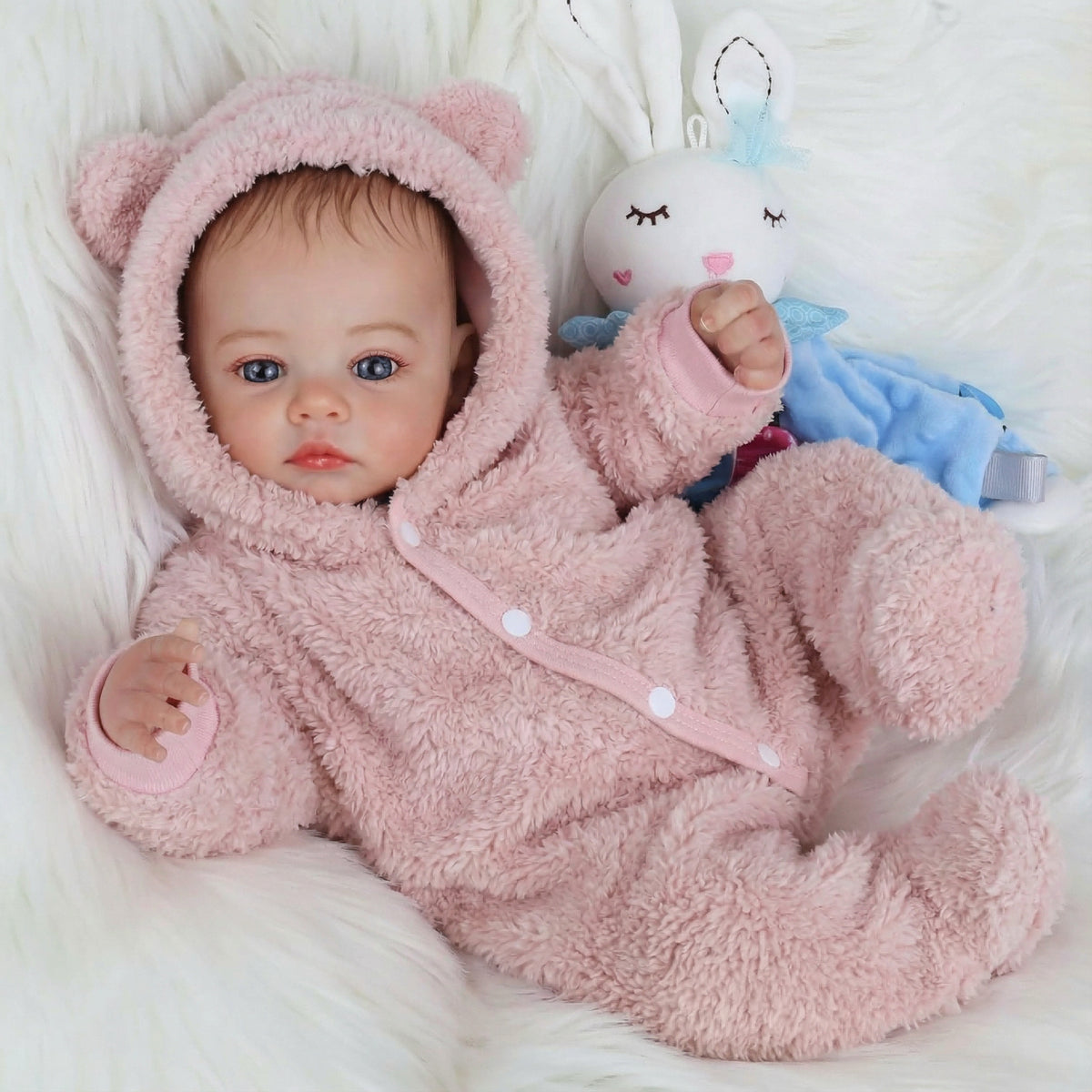 Bebé reborn Meadow de 49 cm con ojos azules y ropa de felpa