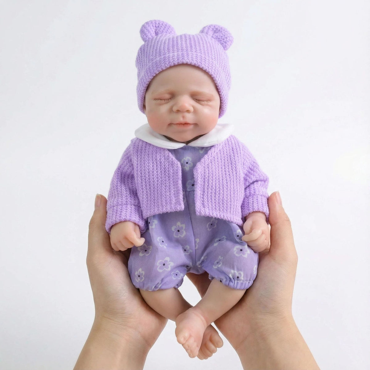 Muñeca reborn de silicona sólida Pascale de 12 pulgadas con cárdigan morado como regalo de Navidad para niños