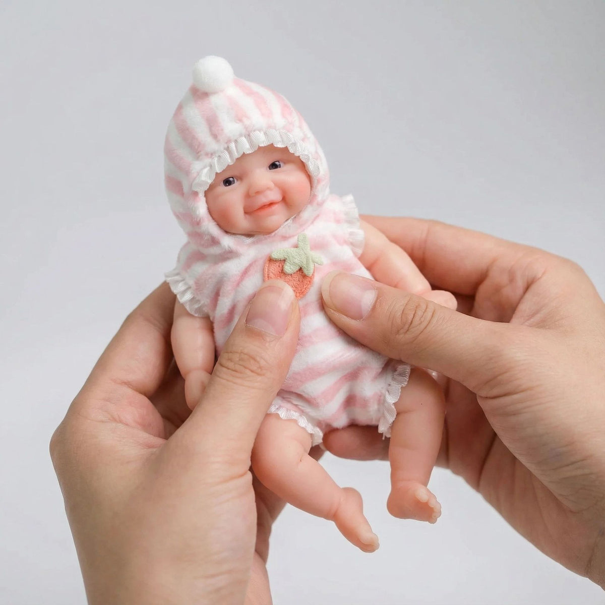 Muñeca reborn sólida de silicona de 6 pulgadas con estampado de fresas