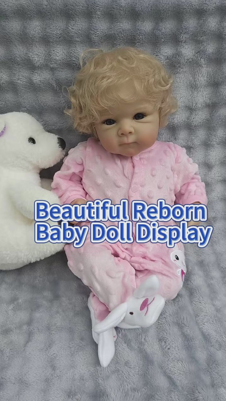 Muñeca reborn Bettie de vinilo completo de 18 pulgadas con mono de conejo rosa