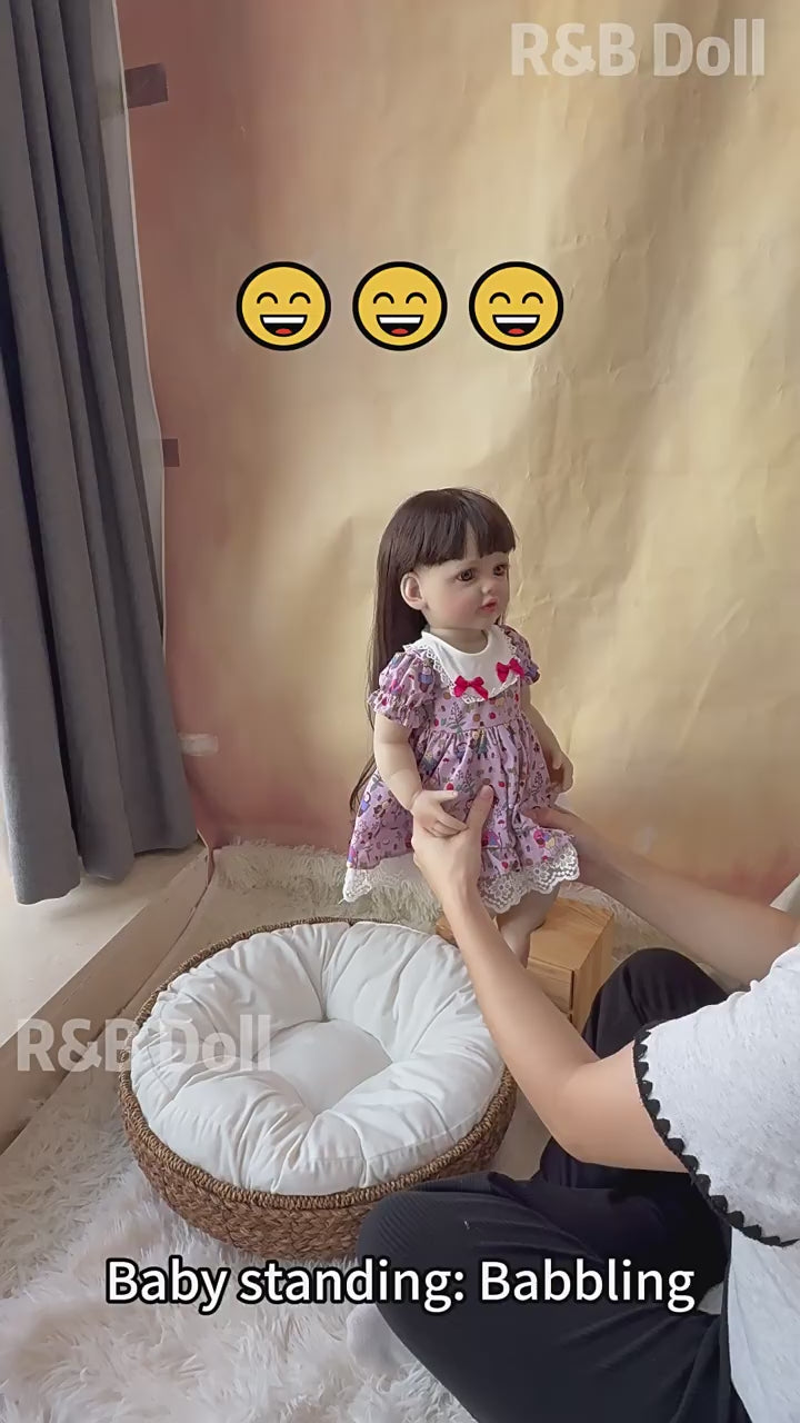Muñeca Reborn de 22 pulgadas con sensor de sonido, disponible en versiones de cuerpo completo de vinilo y de tela, una compañera de juego ideal para niños y coleccionistas adultos en ocasiones especiales.